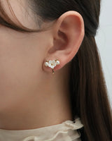 between flower pierce & earring