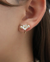 between flower pierce & earring