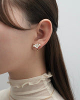 between flower pierce & earring