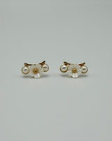 between flower pierce & earring