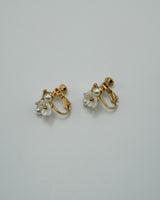 between flower pierce & earring