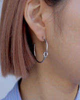 knot hoop pierce