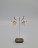 elegant pearl & ribbon pierce