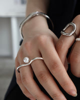 two finger pearl ring