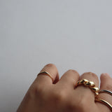 shiny puffy pinky ring