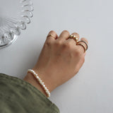 shiny puffy pinky ring