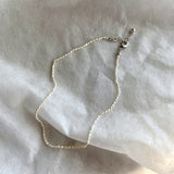 thin pearl necklace