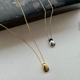 shiny beans necklace