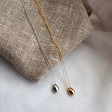 shiny beans necklace