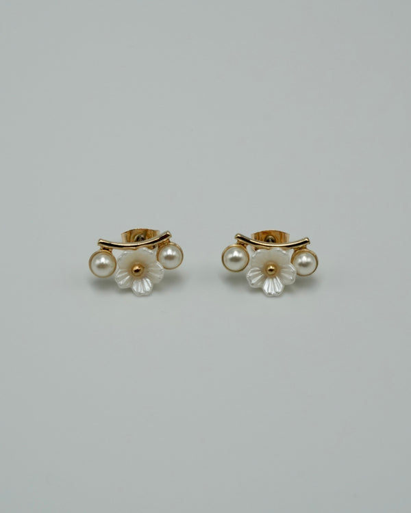 between flower pierce & earring