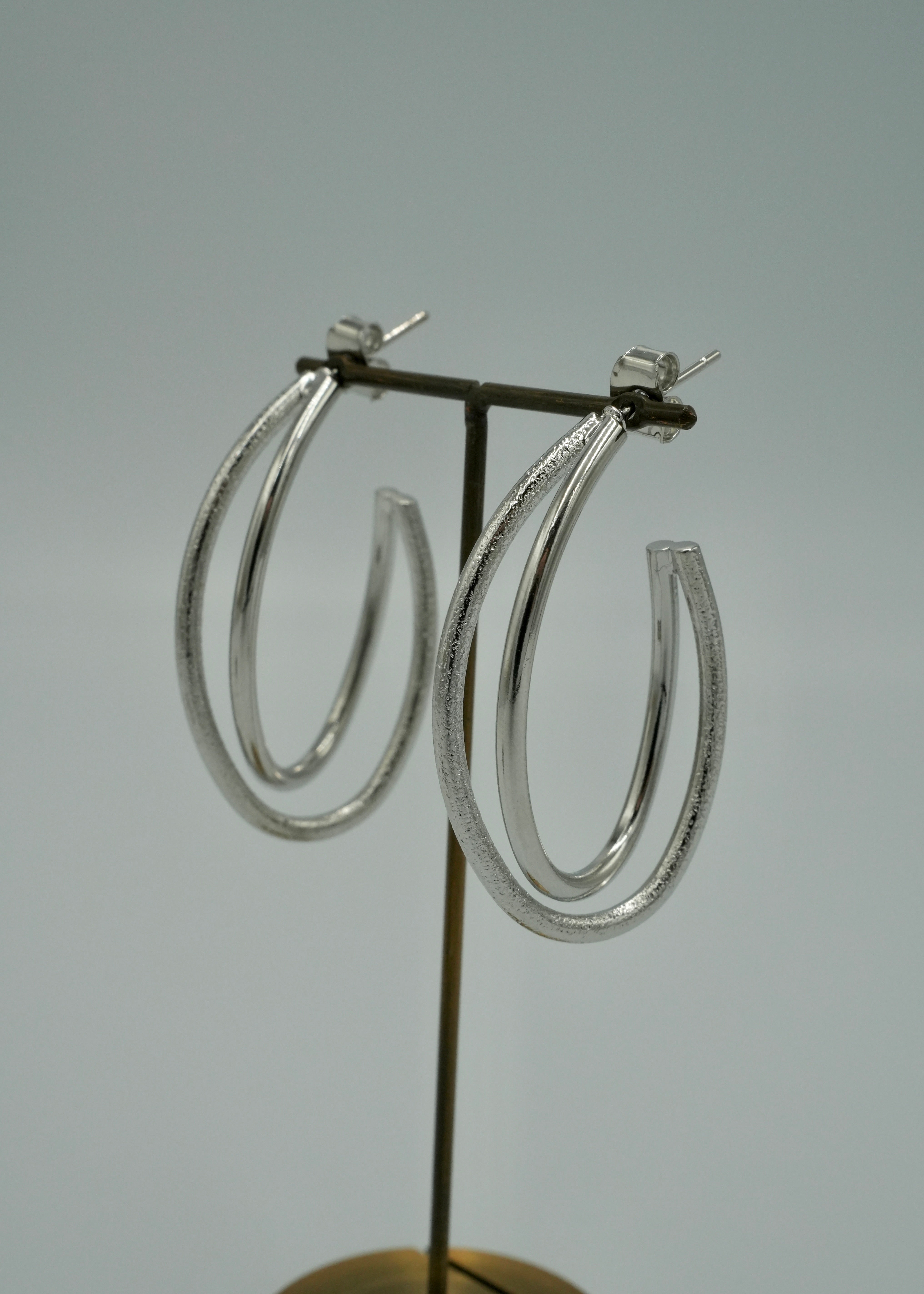 crossed rings pierce - beller