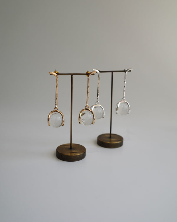 hanging glass ball pierce