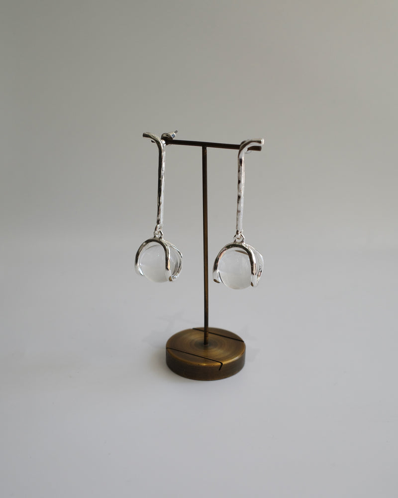 hanging glass ball pierce