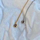 shiny oblong necklace