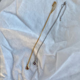 shiny oblong necklace
