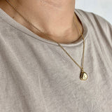 shiny oblong necklace