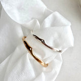 melty triangle bangle