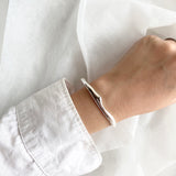 melty triangle bangle