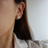 holding pearl pierce