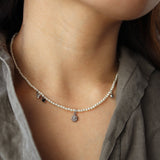 pearl & charm necklace