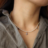 pearl & charm necklace