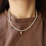 pearl & charm necklace