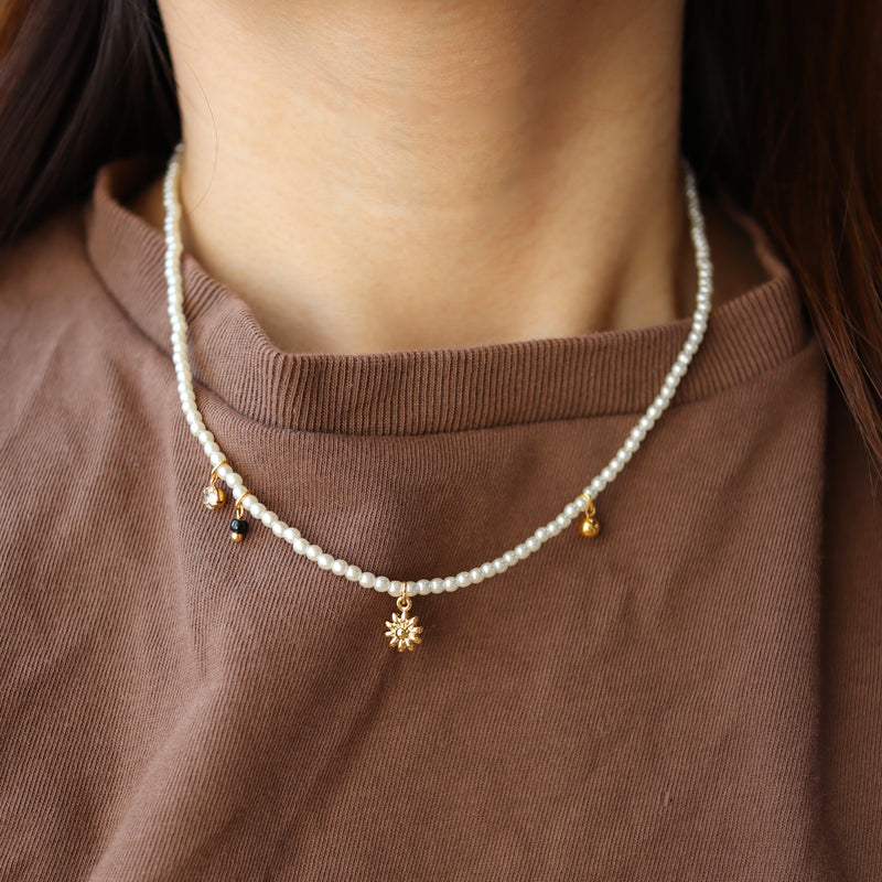 pearl & charm necklace