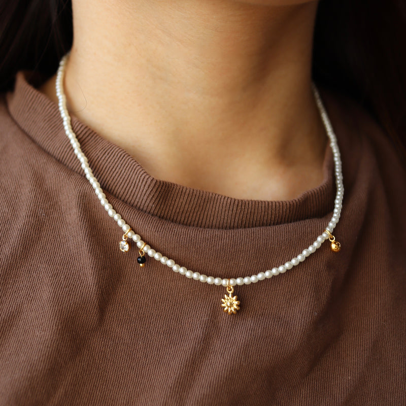 pearl & charm necklace