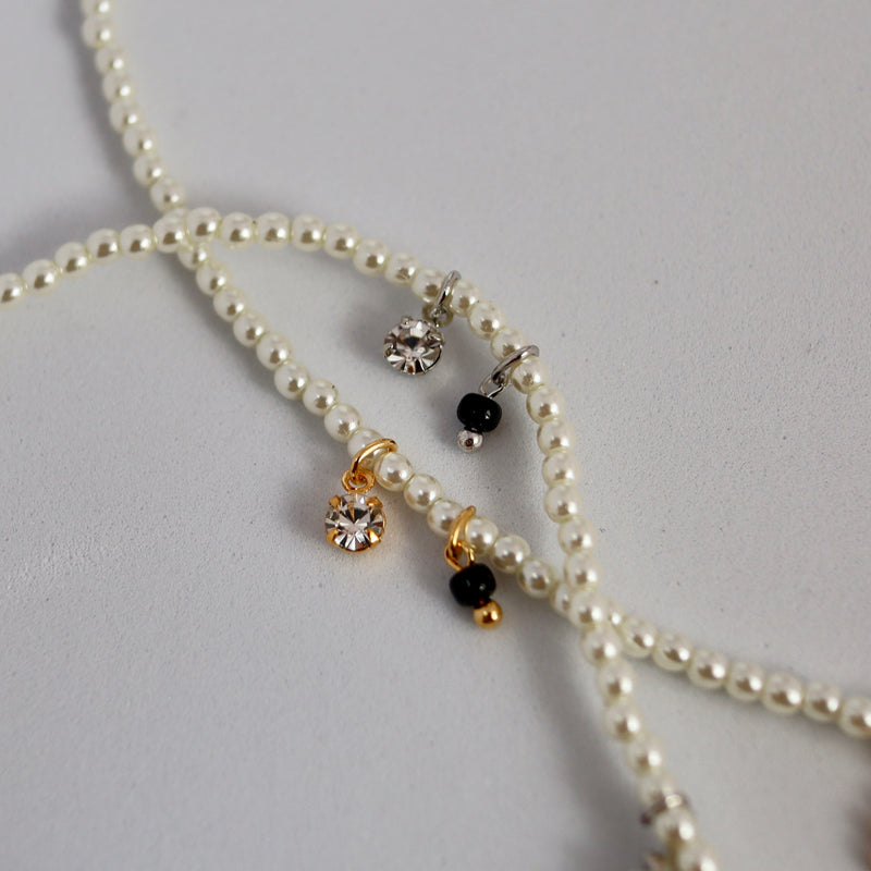 pearl & charm necklace