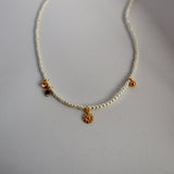 pearl & charm necklace
