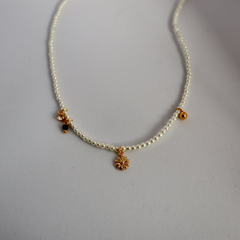 pearl & charm necklace