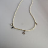 pearl & charm necklace