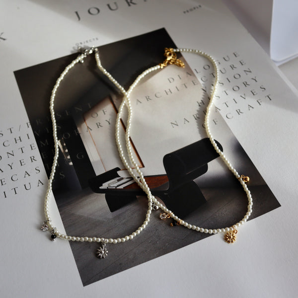 pearl & charm necklace