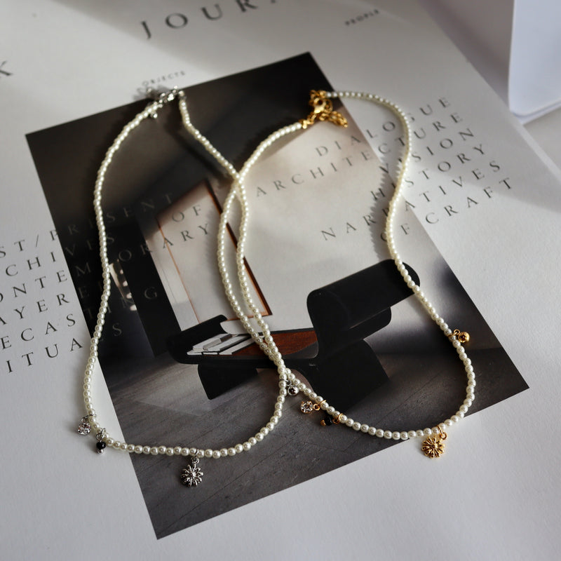 pearl & charm necklace
