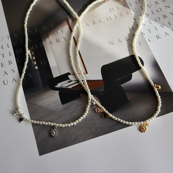 pearl & charm necklace