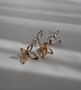 docile flower pierce